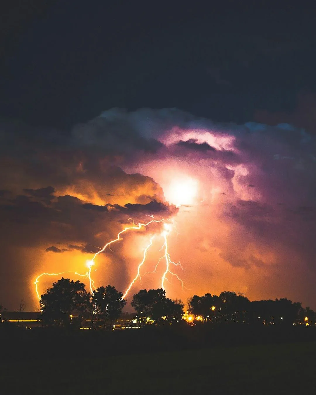 Storm clouds are  looming over a residential neighborhood – a reminder that storm damage can happen anytime. Be prepared with expert storm damage repair in Middle Georgia. Call Rick Moore Contracting.