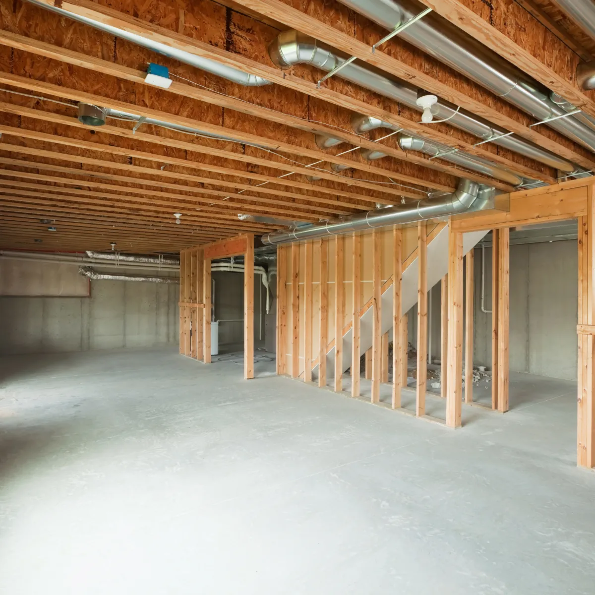 Équipe professionnelle de Construction Carl Breton inc. réalisant Plancher d’époxy pour garage