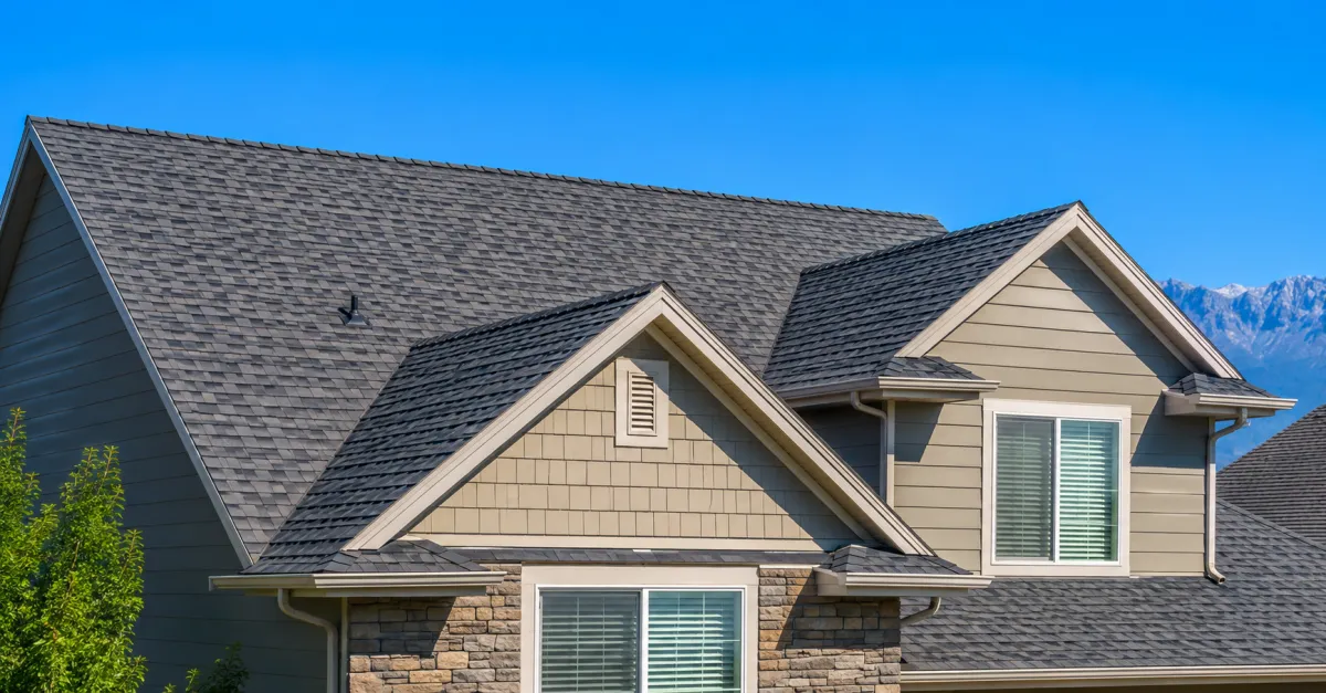 A well-maintained Utah roof shown in clear daylight, representing roof longevity