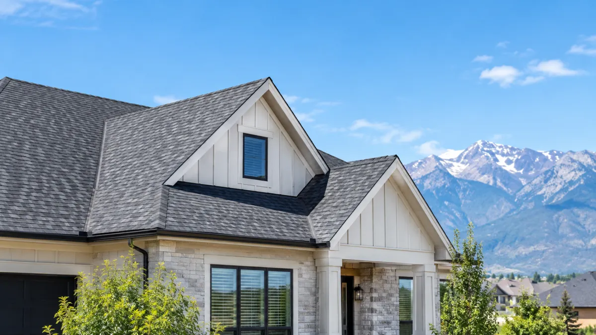A newly replaced asphalt shingle roof on a Utah home