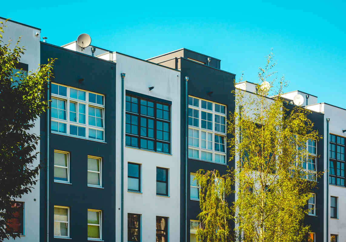 Professional discussion during a multifamily property walkthrough