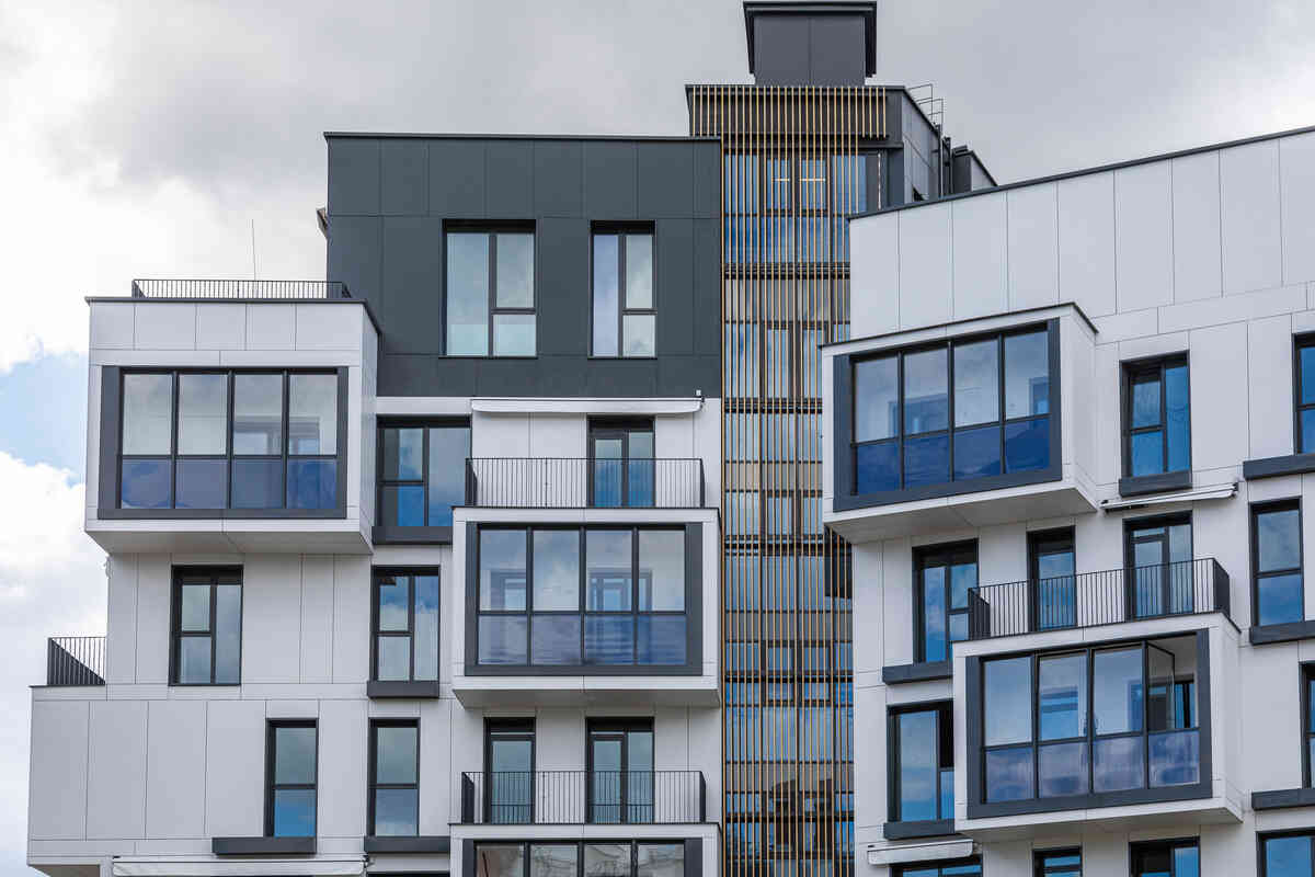 Greener Path Capital team reviewing a multifamily property plan