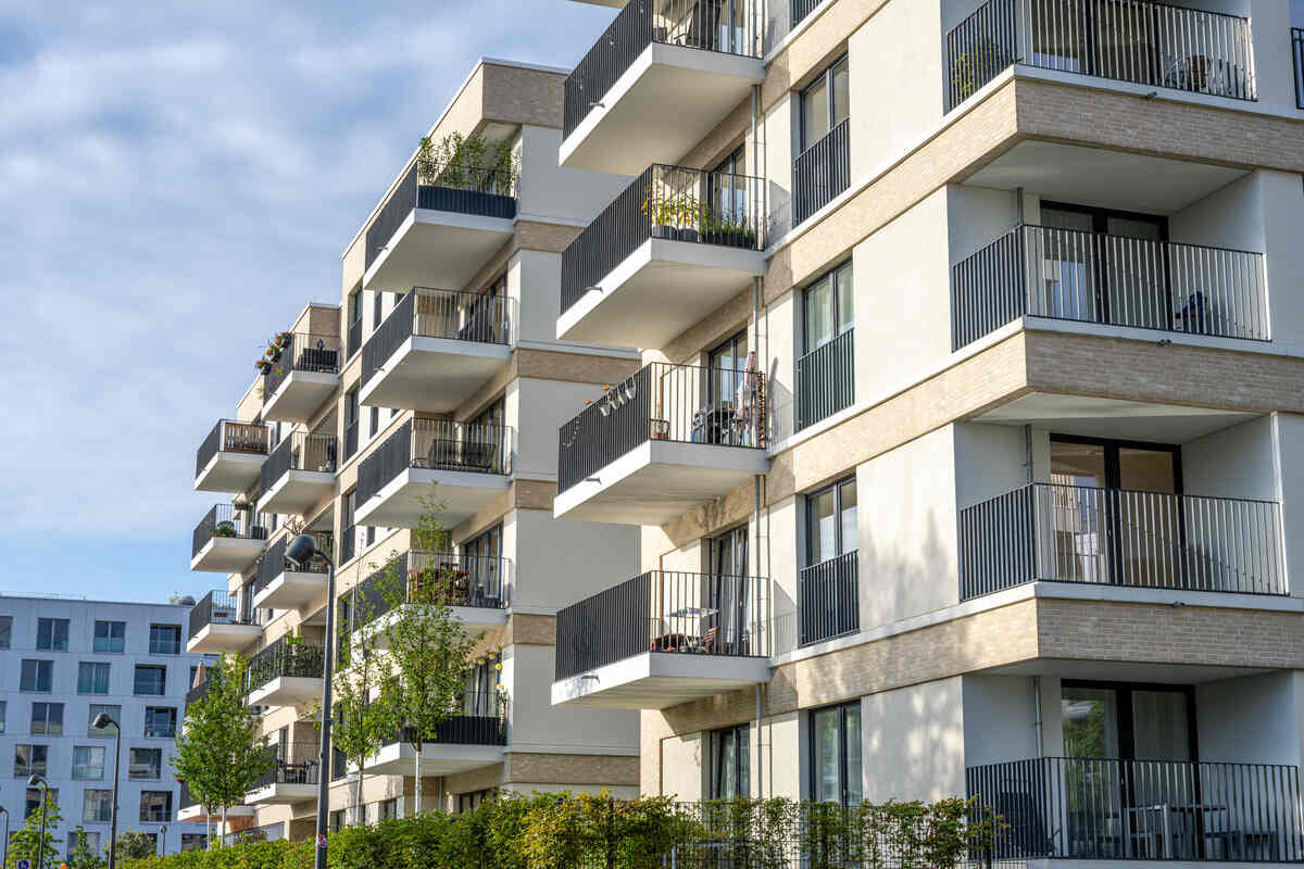 Greener Path Capital team in a meeting reviewing a multifamily property plan