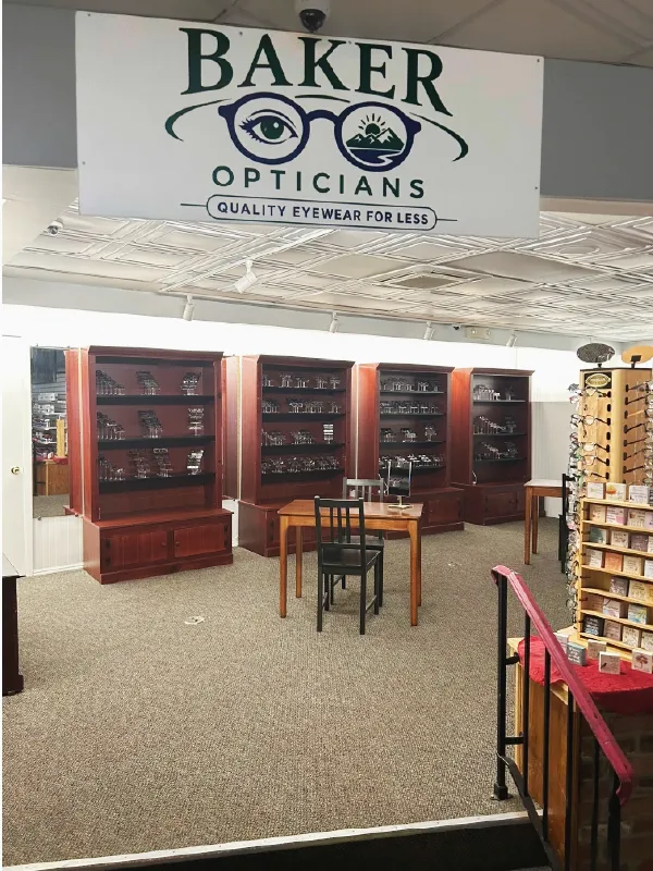 Modern interior of Baker Opticians store in Sussex showcasing designer optical frames and consultation area