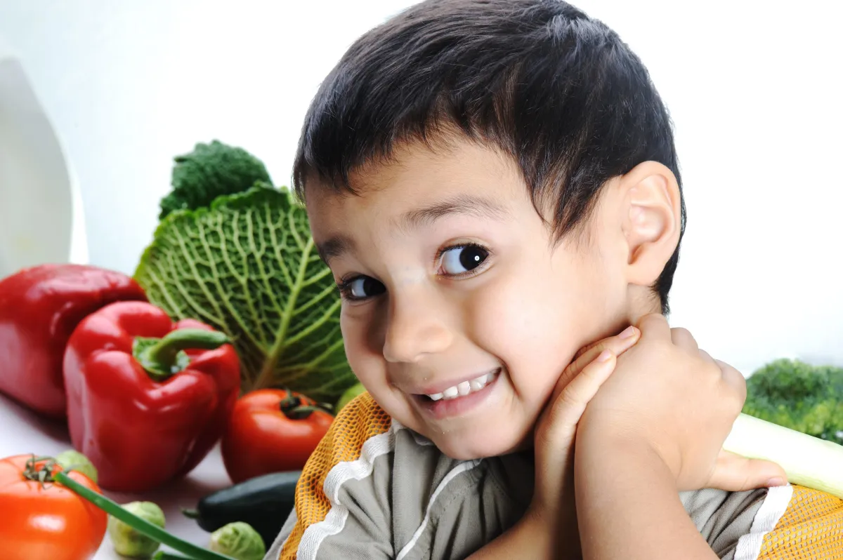 Young boy with healthy food options