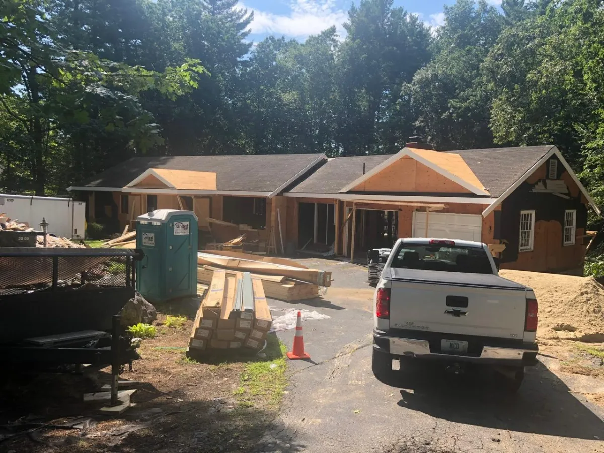 Bay window trim installation over Tyvek house wrap by McCarthy Exteriors LLC in Southern NH