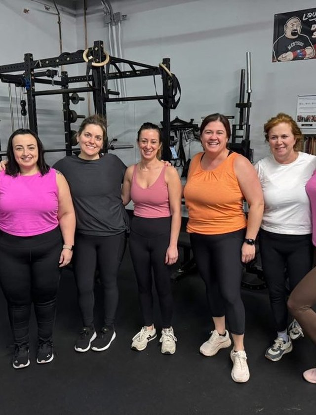 A group of members together after training