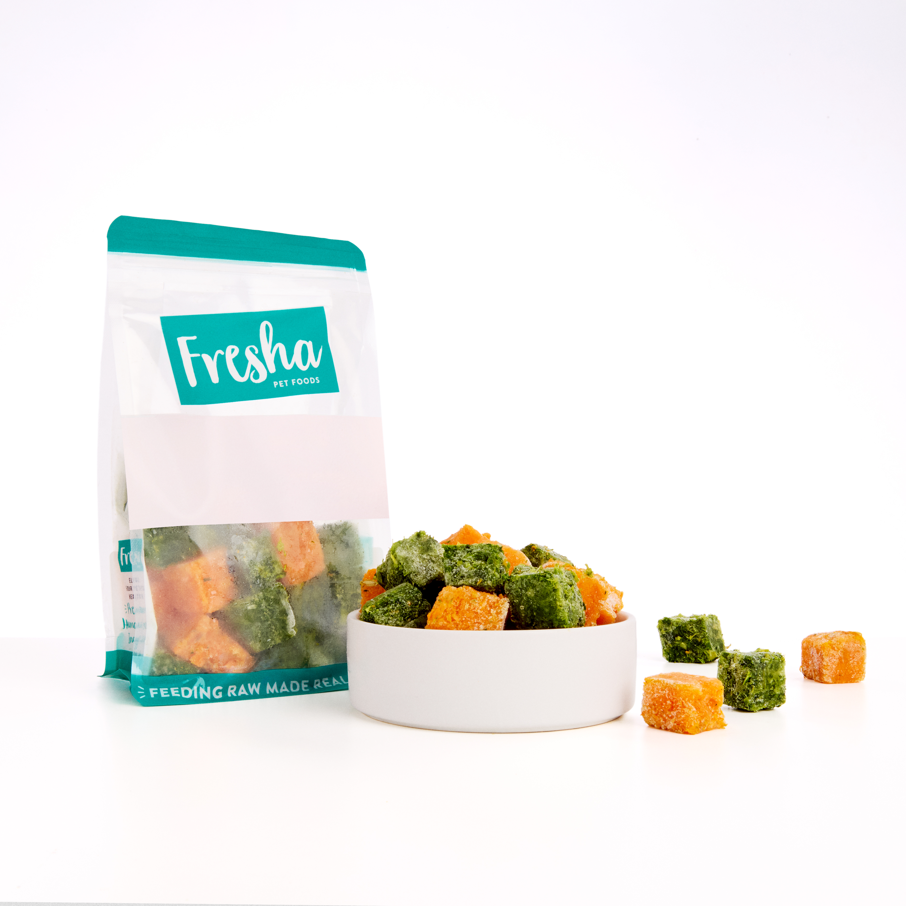 Vegetable cubes for dogs in a bowl