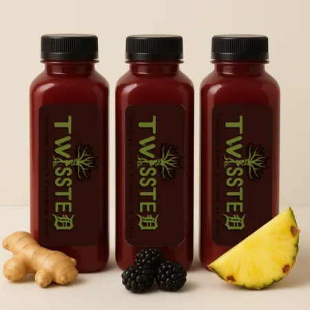 Three 12oz Maroon Colored Square Bottles with "Twissted" Logo Label surrounded by Berries, Pineapple and Ginger on a clean white background