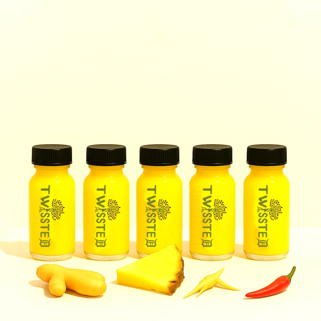 Five 2oz Yellow Colored Small juice bottles with "Twissted" Logo Label surrounded by ginger, Pineapple, ginseng and chili pepper on a clean white background