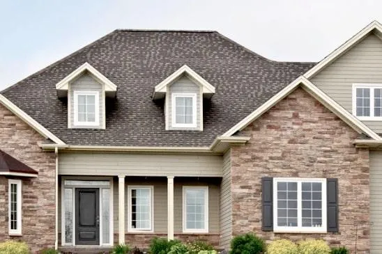 a shingle roofing of a house