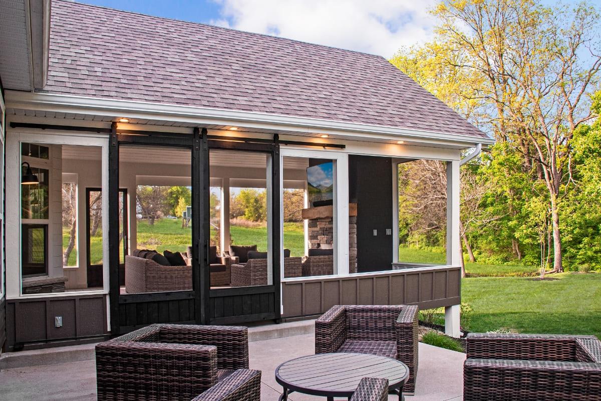 an addition of a house with glass windows