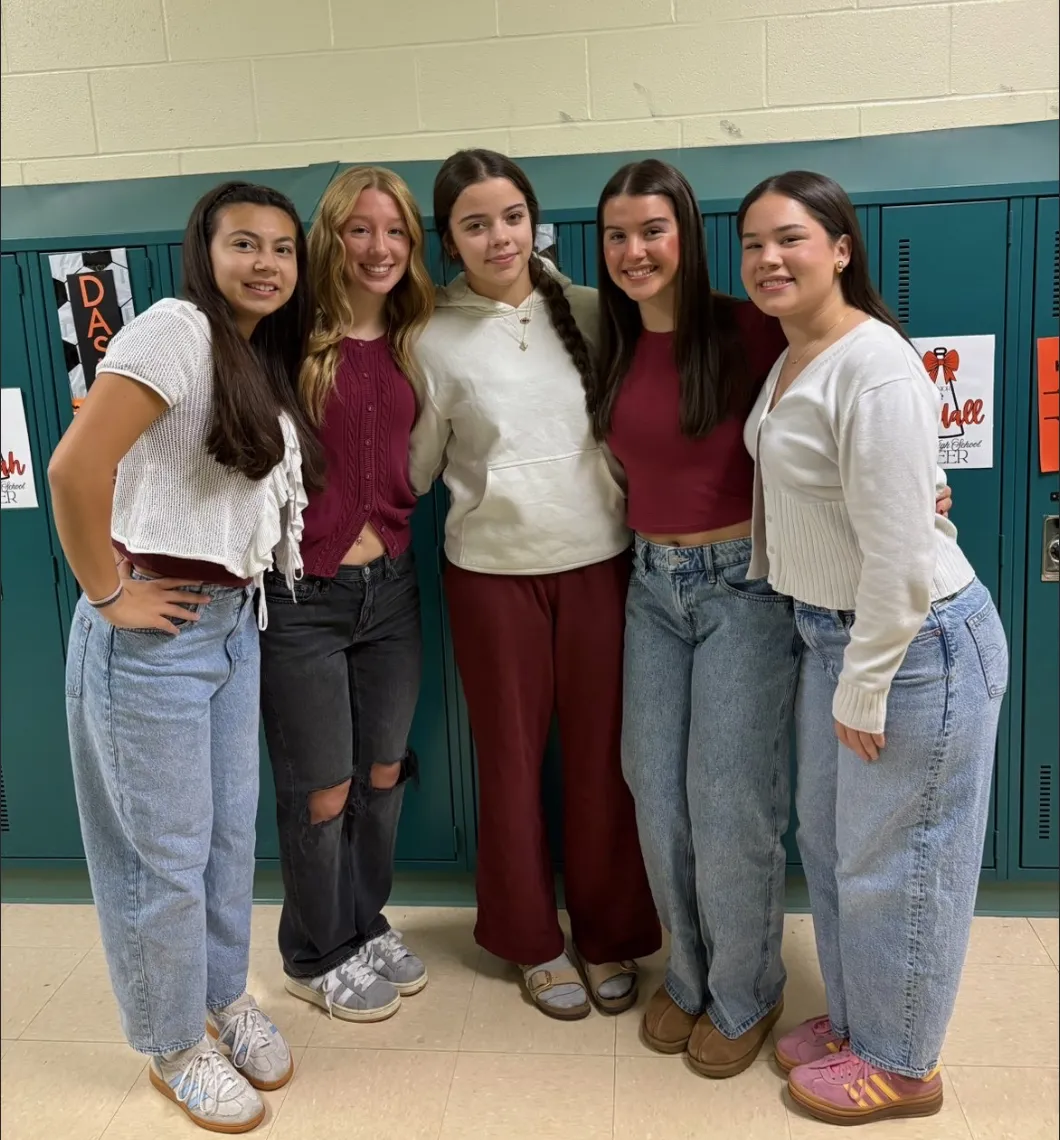 Lifestyle shot of LustreCarry jewelry bags with organized compartments and gold jewelry.