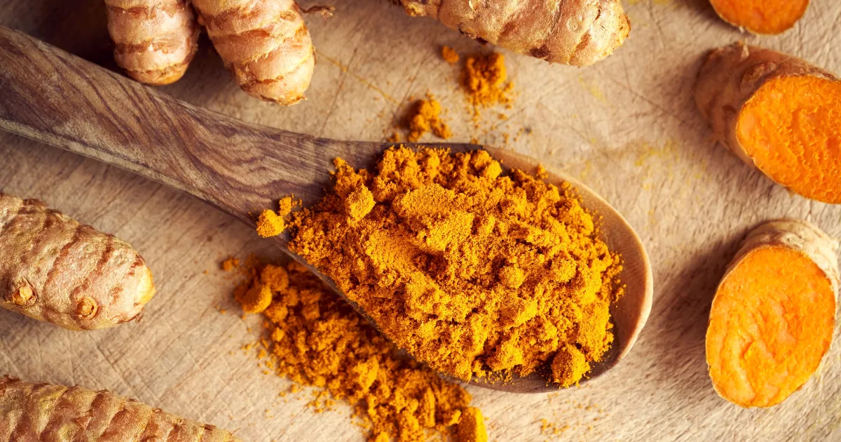 green grass field near mountain