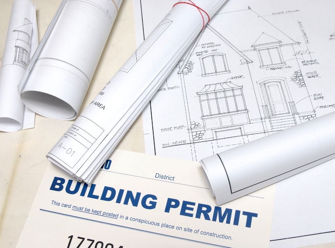 Building permit and blueprints