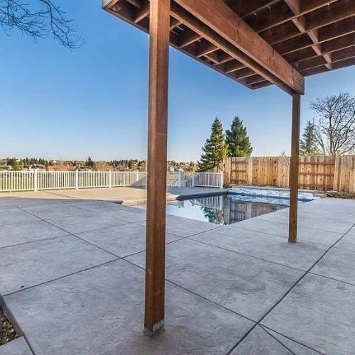 patio cover builders enhancing backyard shade design