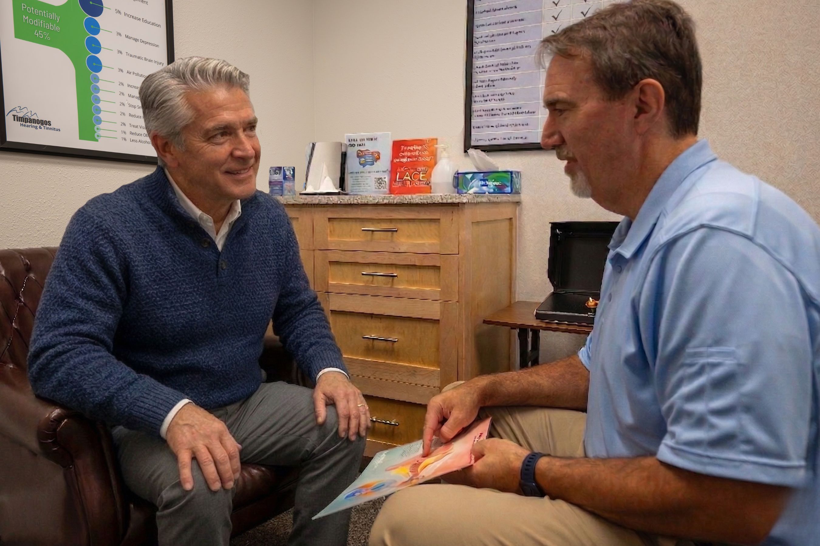 Doctor answering patient questions with a smile