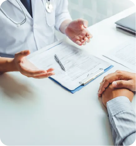 A white hand opened wide across a fold a folded colored hand