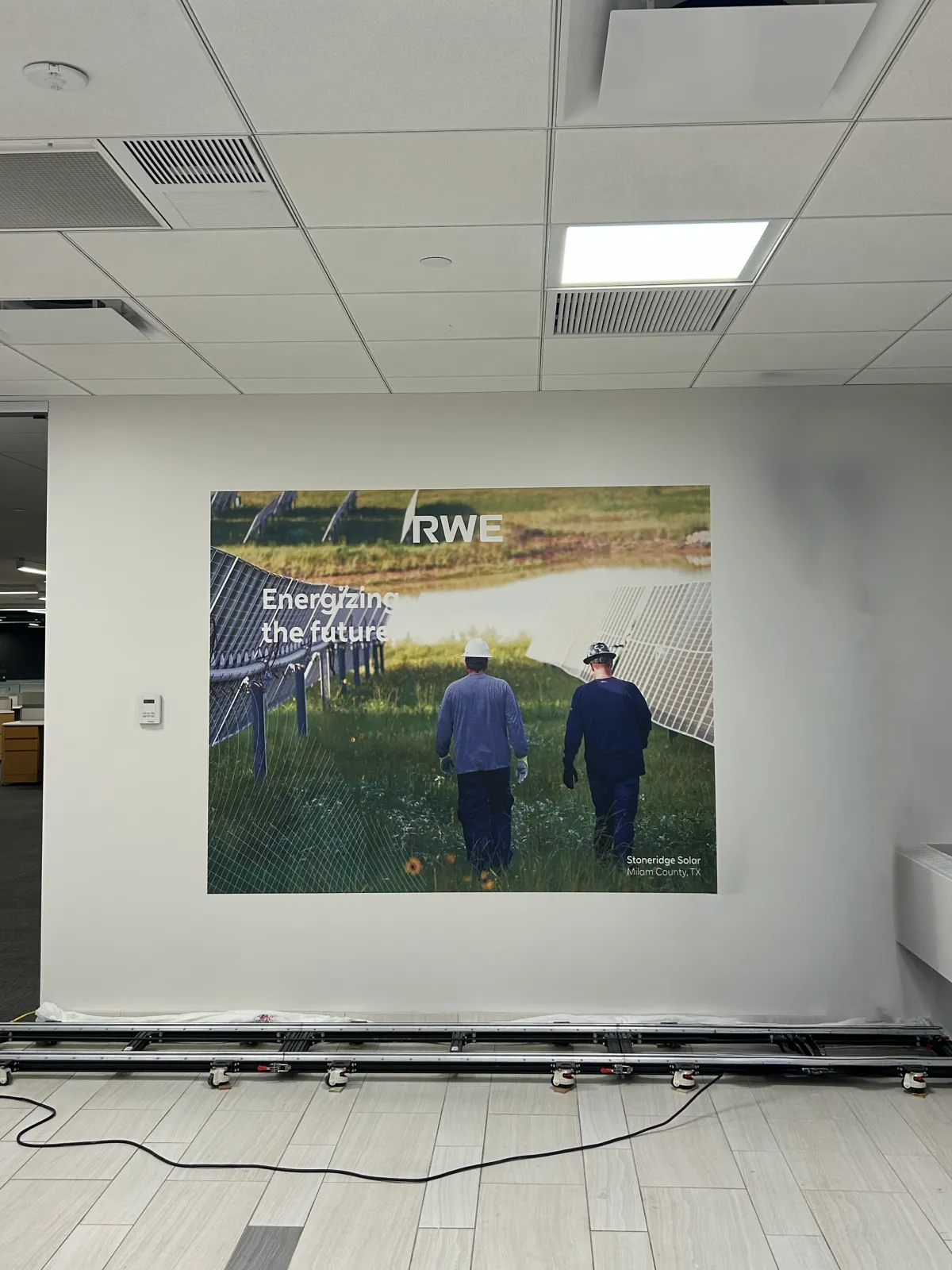 Custom wall mural printing transforming plain wall into artwork
