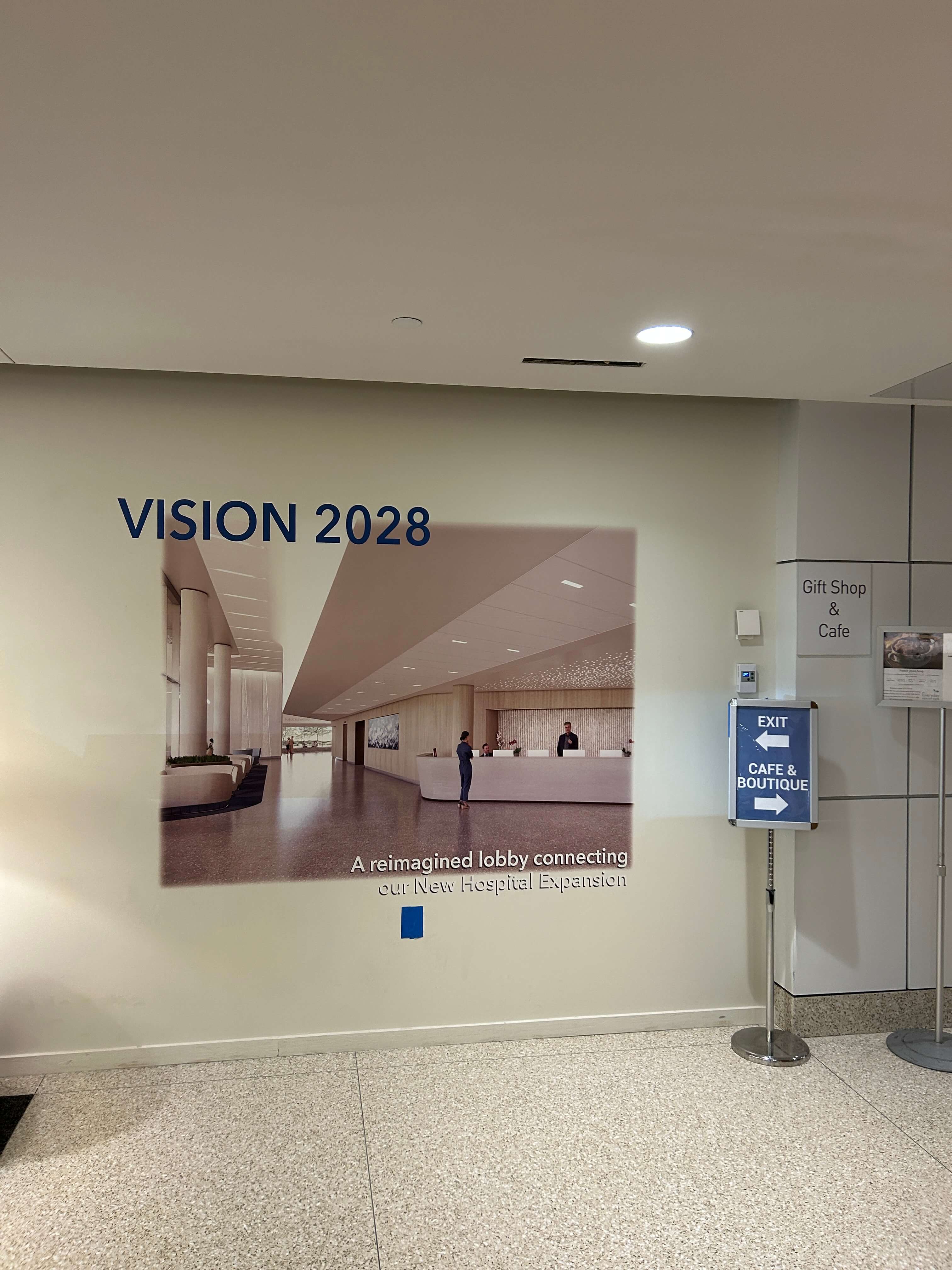 Healthcare clinic waiting room with soothing wall mural