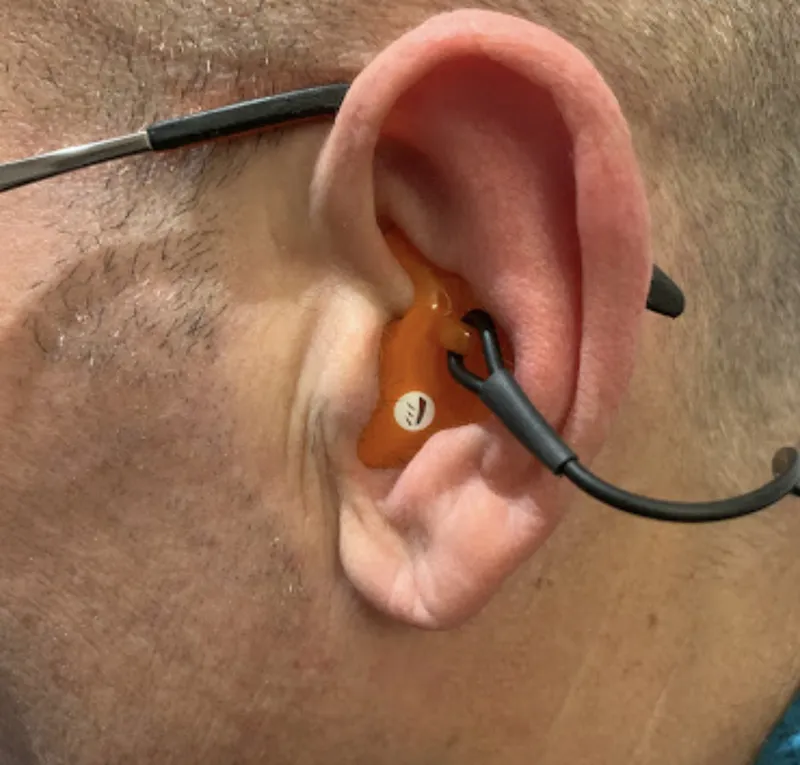 Bespoke custom-molded ear plug fitted by a professional audiologist in Lancing