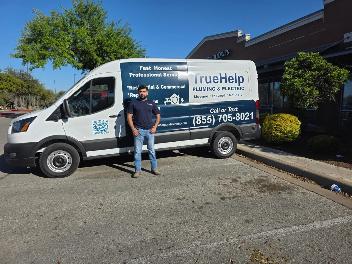 Licensed electrician repairing a residential electrical panel in Austin, TX