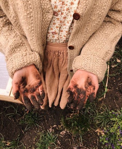 child with dirty hands