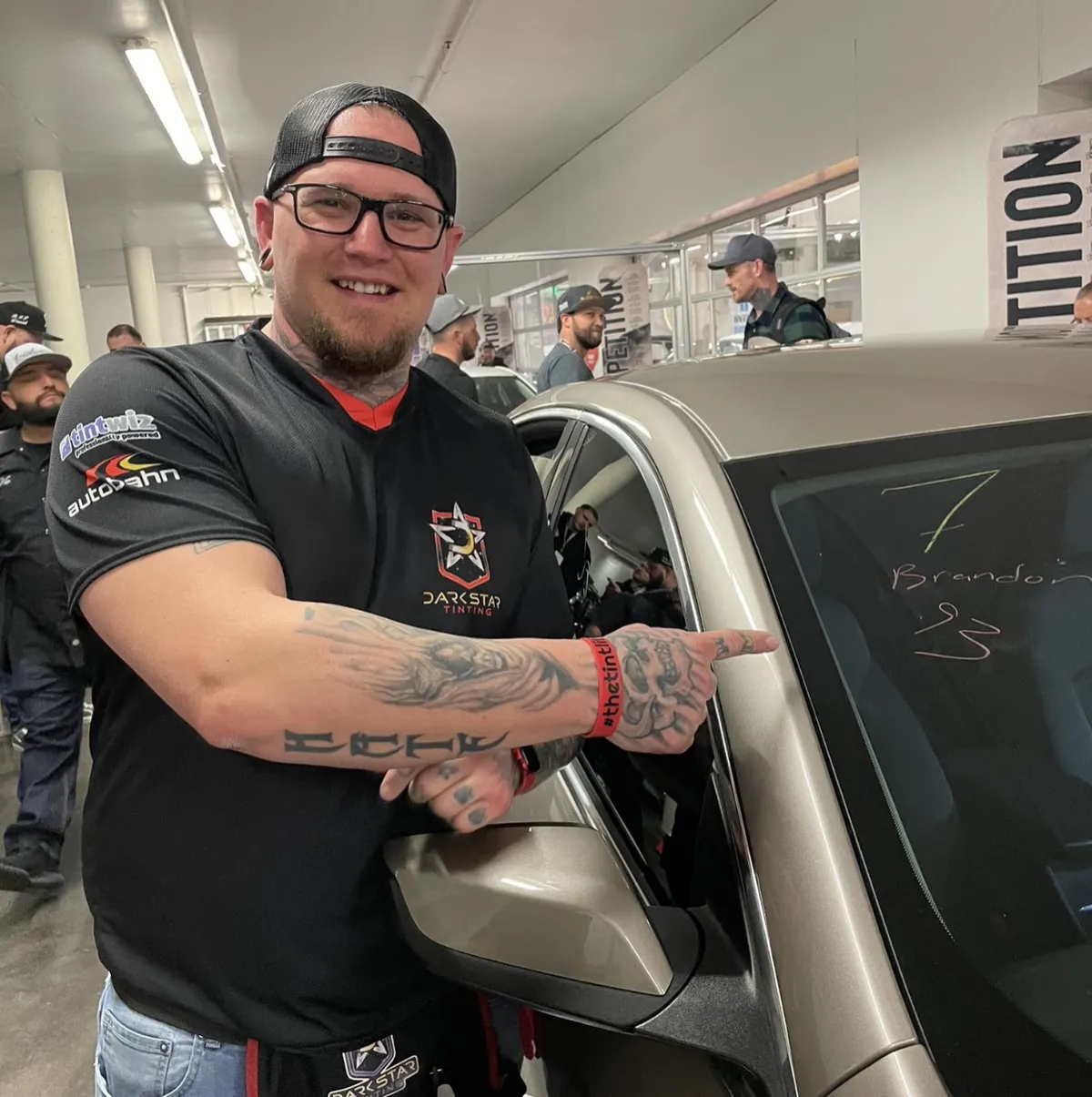 Brandon installing DarkStar automotive window tint