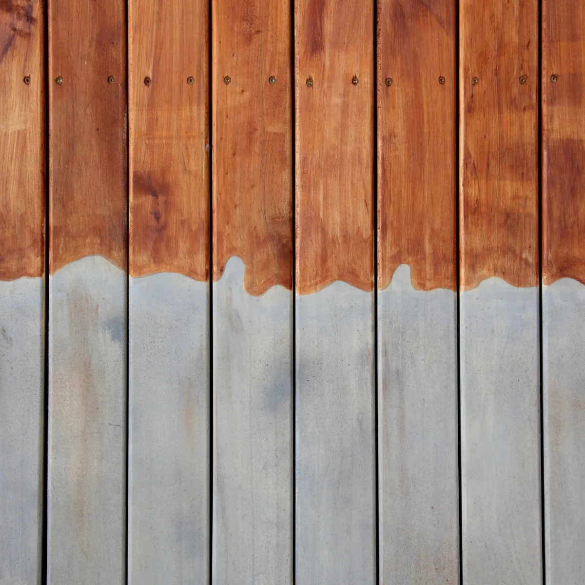 Deck staining and painting providing weather protection and enhanced wood appearance.