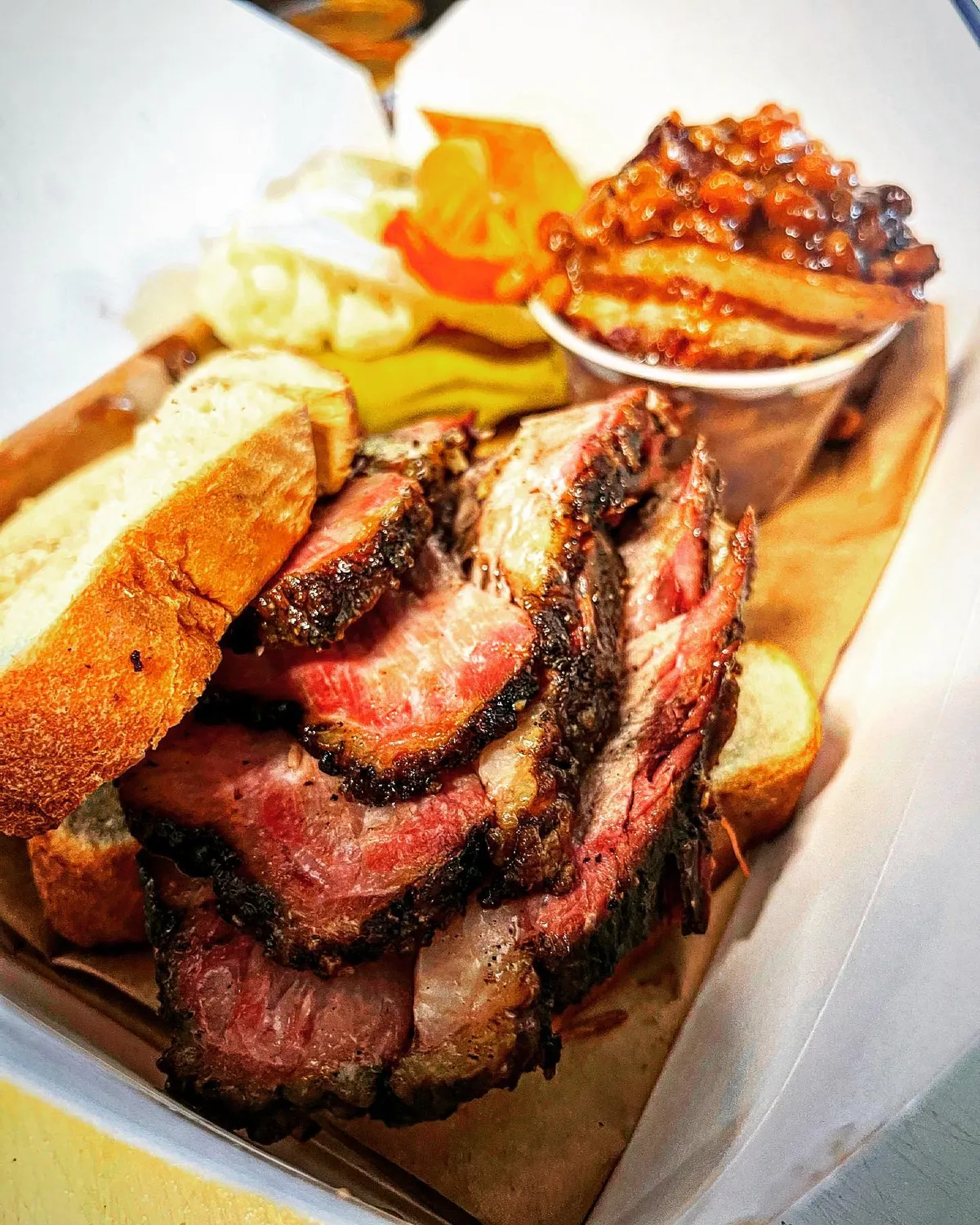 A barbecue sandwich tray with sides