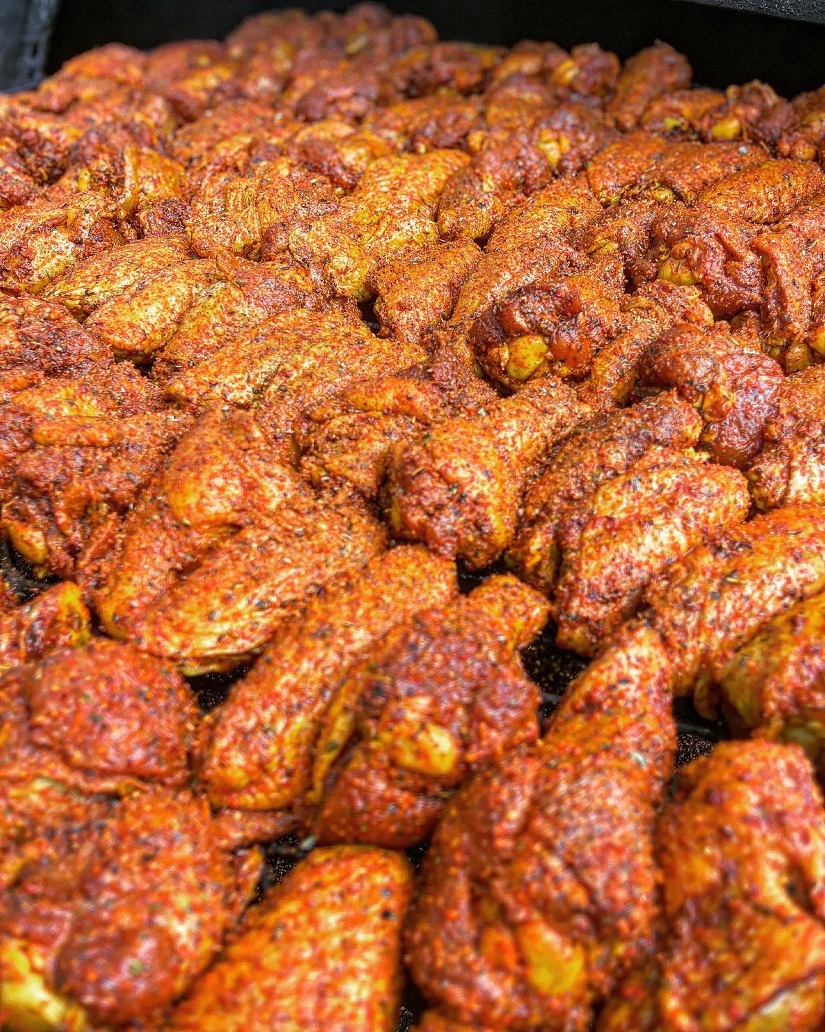 A pile of smoked chicken wings
