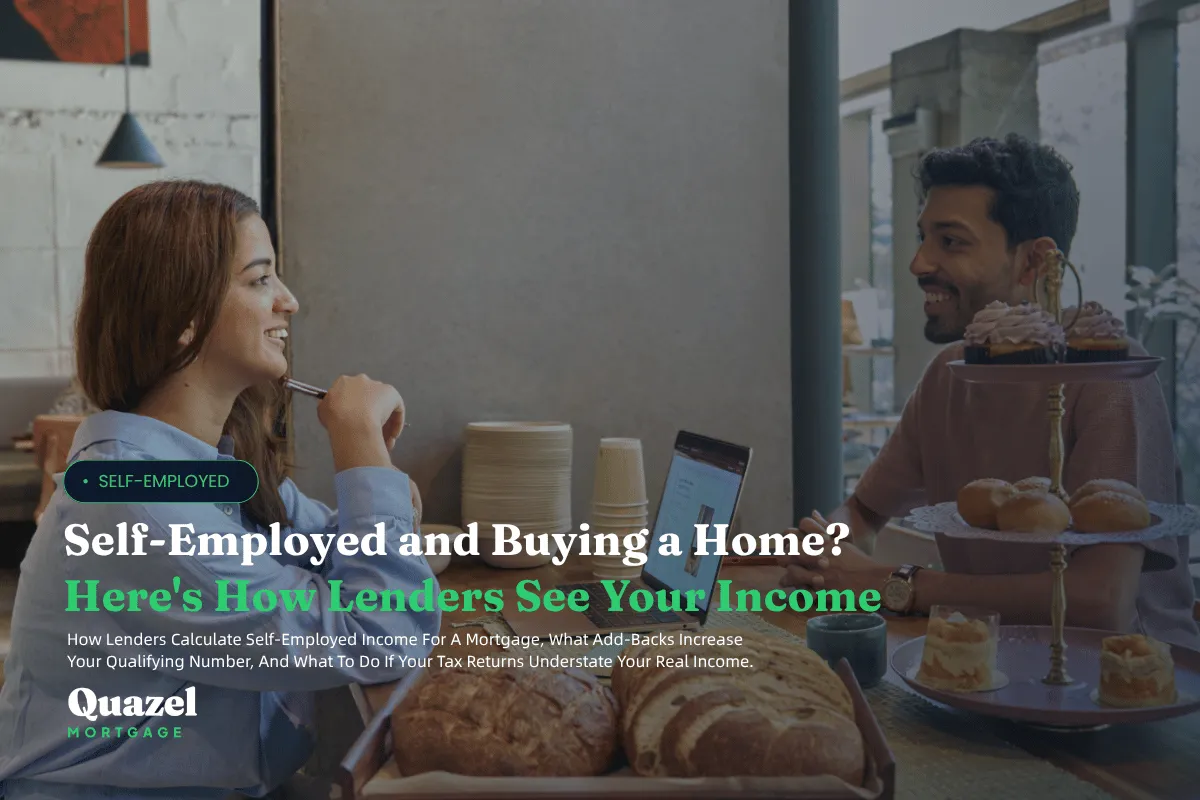 A young Self-Employed couple sitting in a bakery talking over a table and laptop.