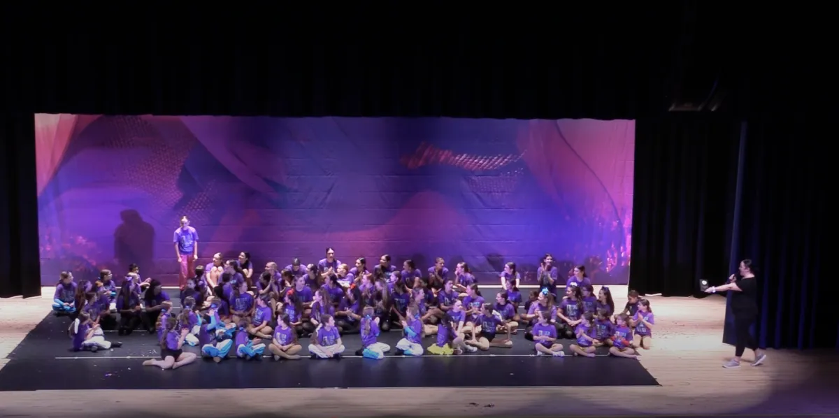 Finale bow with all dancers on stage during dance recital