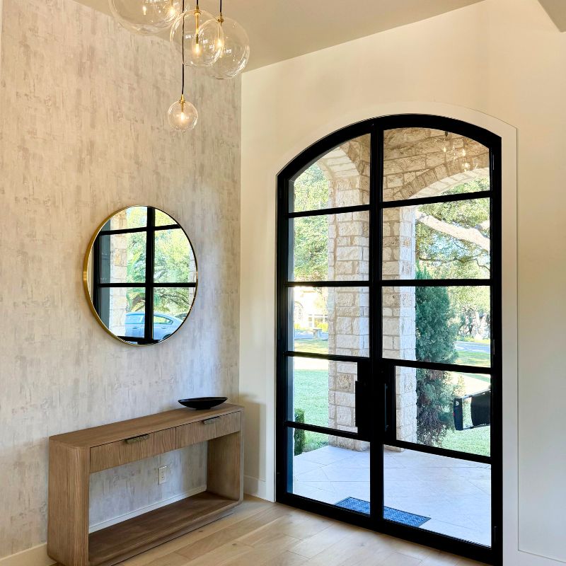 Contemporary Austin entrance with modern statement door and lots of light