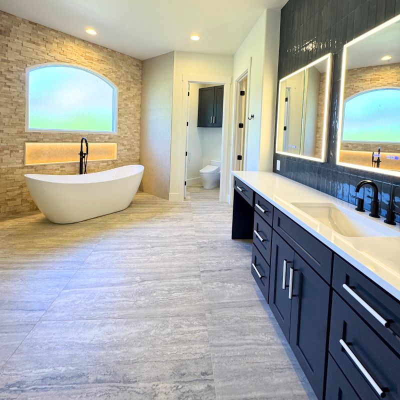 Luxury primary bathroom transformation with freestanding tub and walk-in shower, Austin