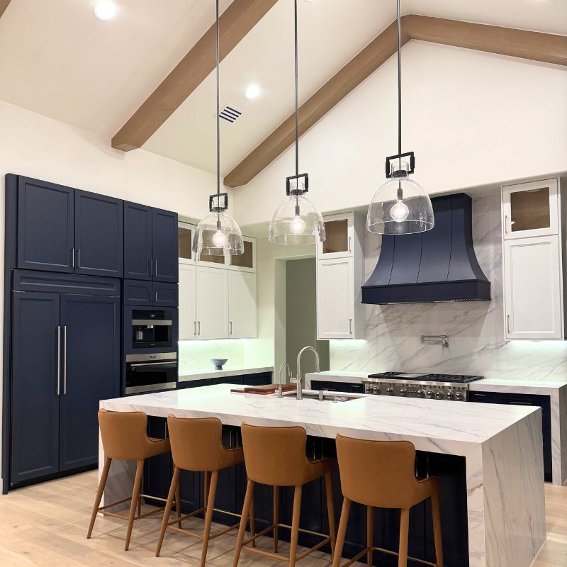 Contemporary Austin kitchen remodel with custom cabinets and waterfall island