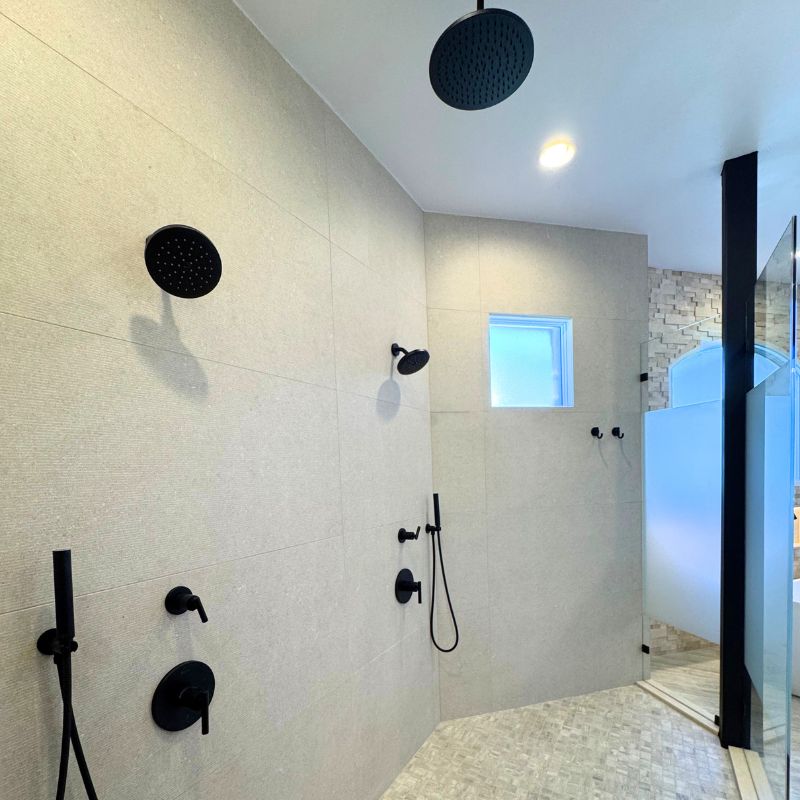 Austin spacious & custom walk in shower after remodel with multiple shower heads