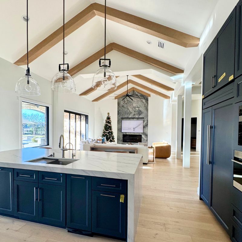 after full home remodel in Austin TX - open layout living room & modern kitchen