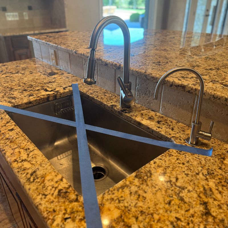Cramped 1980s Austin kitchen with old counters, dark cabinets, and poor lighting