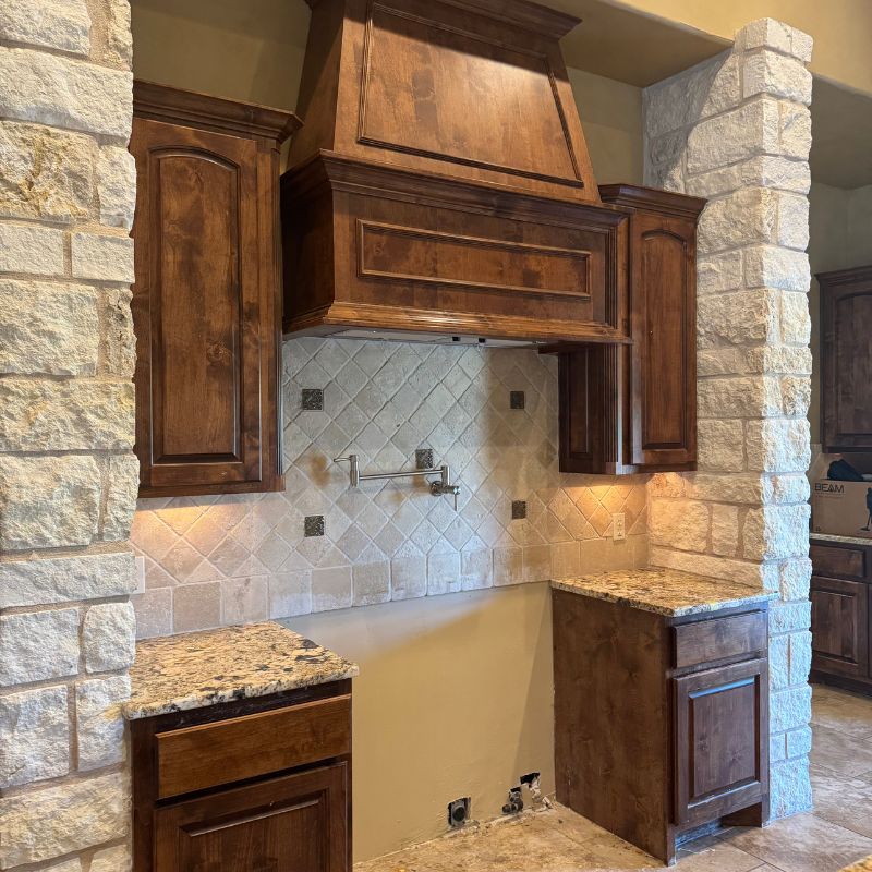 Dated Austin kitchen with dark wood cabinets and closed layout