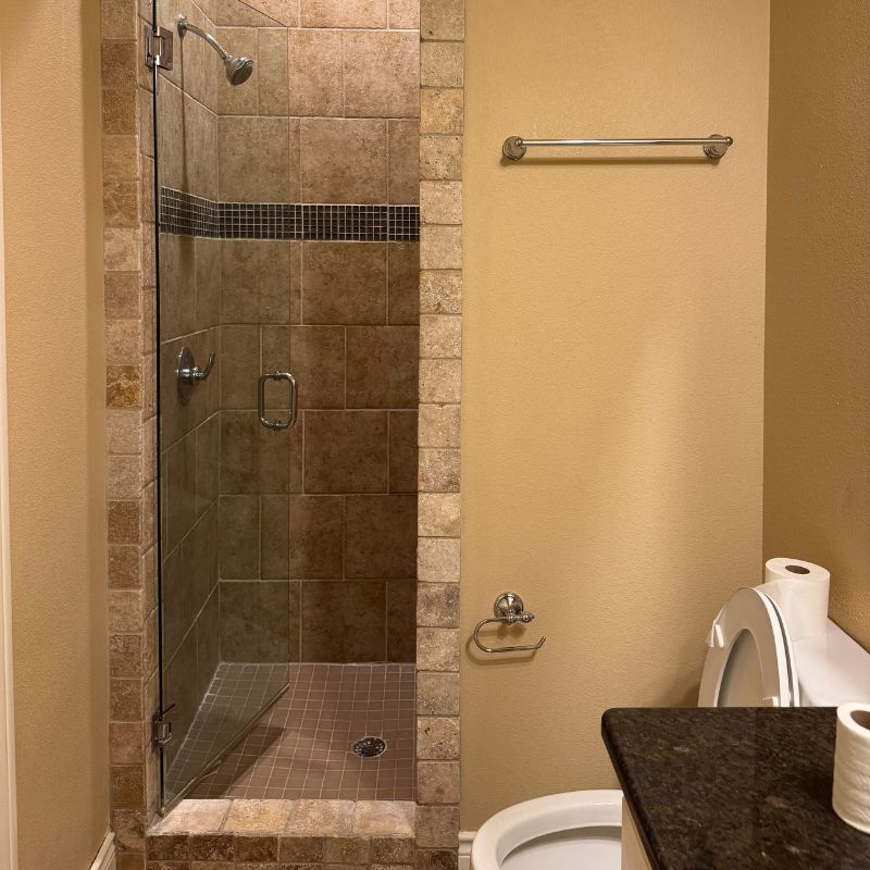 Before full home remodel in Austin TX - tiny shower & cramped bathroom