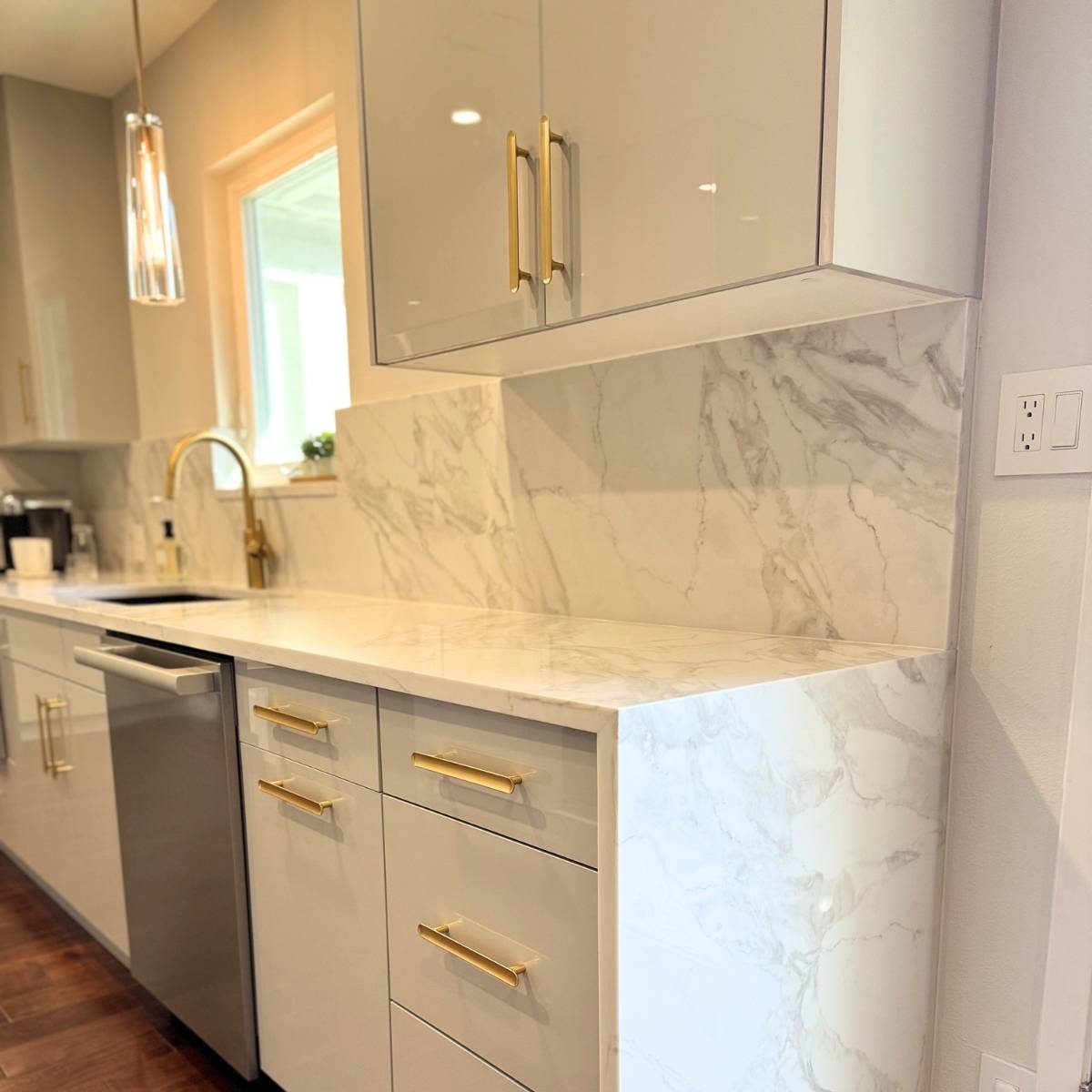 Austin kitchen after waterfall cabinets that go down the side