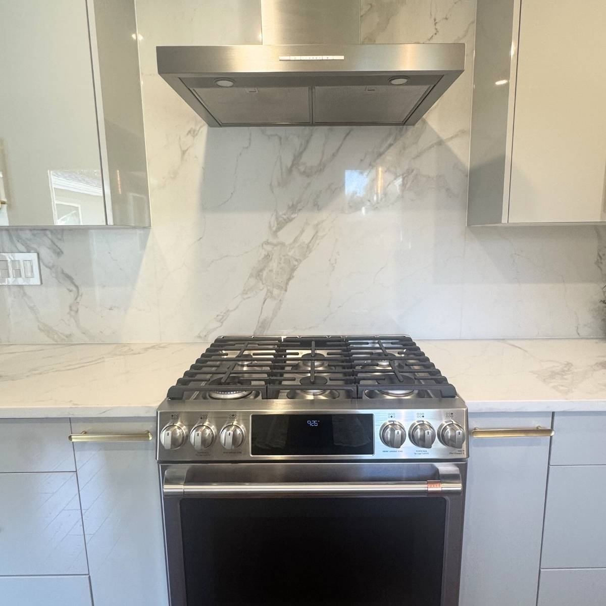 Austin kitchen after stainless steel range hood & stovetop