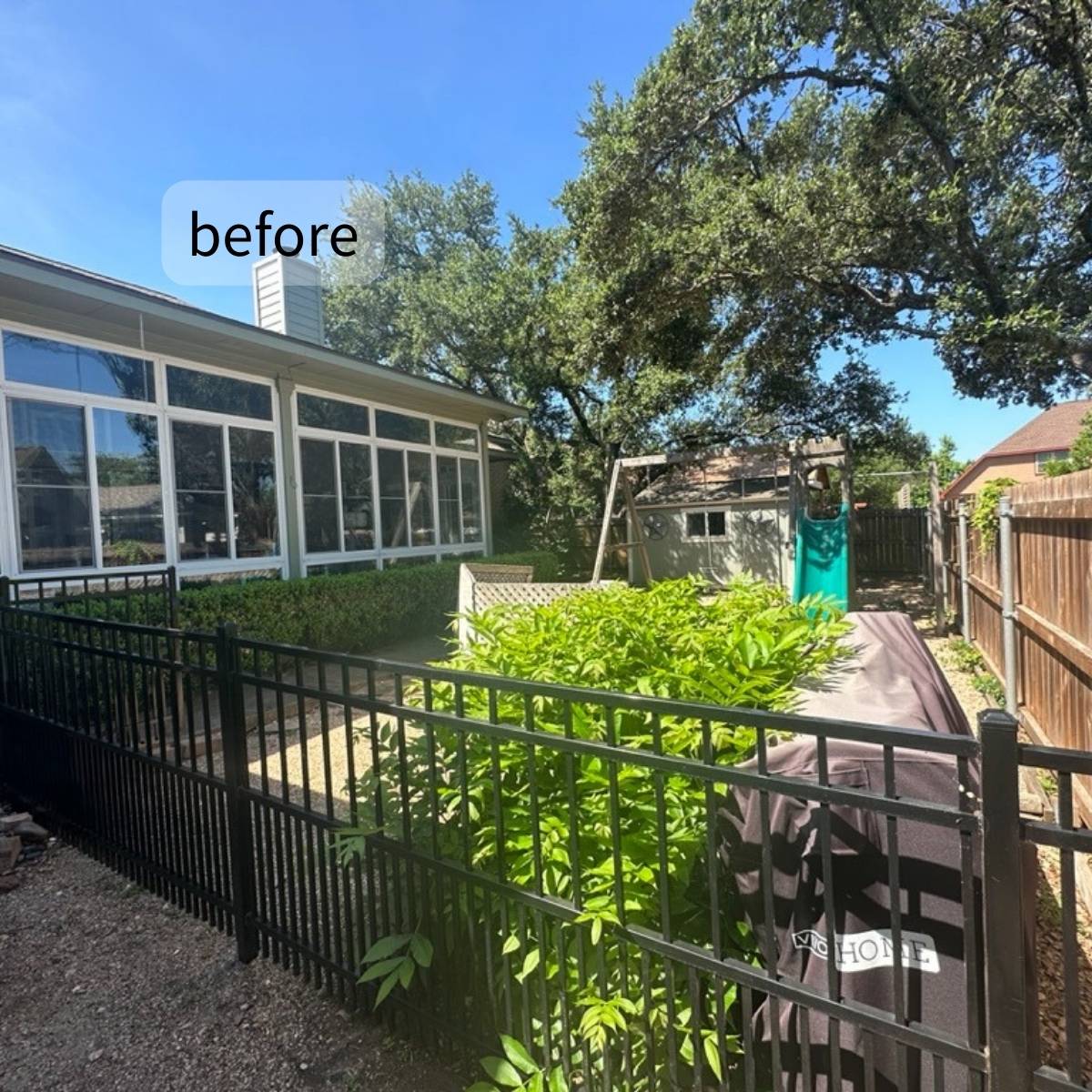 Before: small cracked concrete patio in Austin yard before outdoor kitchen remodel
