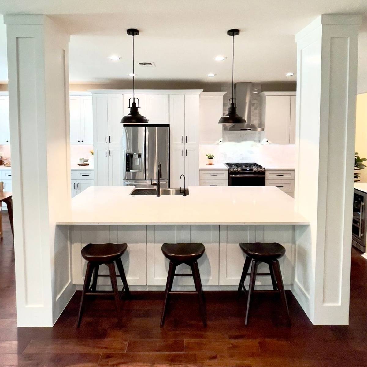 After: Bright modern Austin kitchen renovation - open layout with white island