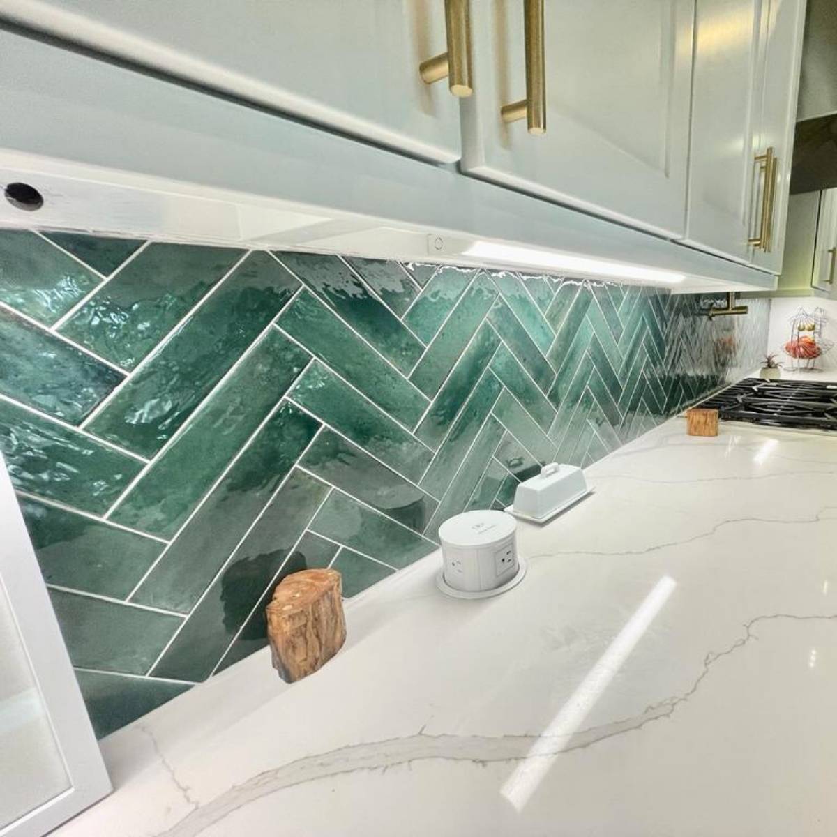 After: Bright modern Austin kitchen renovation - white cabinets and green herringbone backsplash