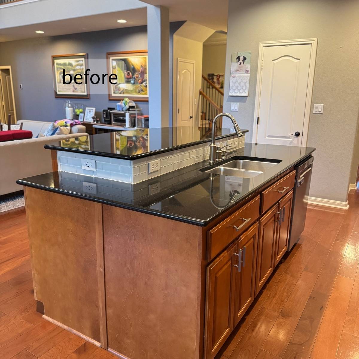 Before: Outdated Austin home kitchen with dark cabinets and poor lighting