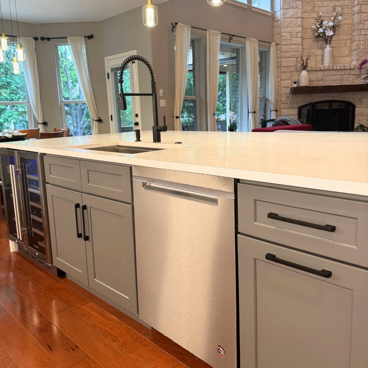 After: Bright modern Austin kitchen renovation - grey cabinets & large island