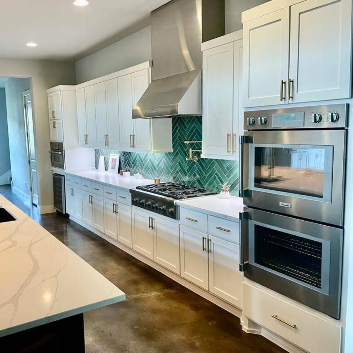 After: Custom Austin TX dream kitchen by ATX Custom Remodel - white cabinets and double ovens