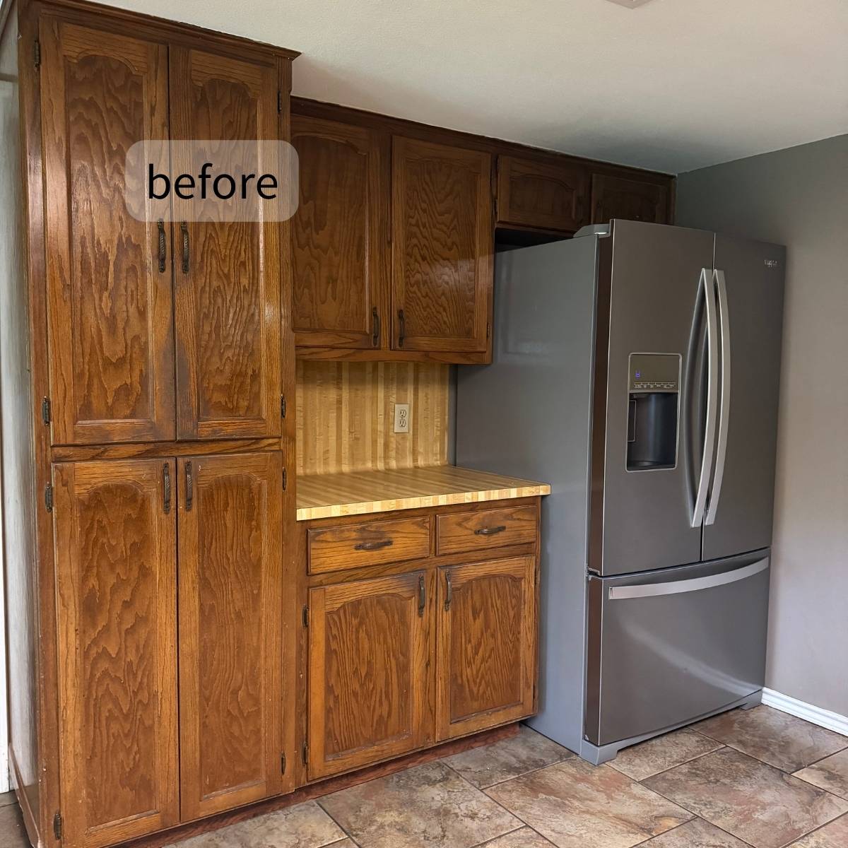 Before: 1970s Austin kitchen before transformation - dark wood cabinets and cramped layout